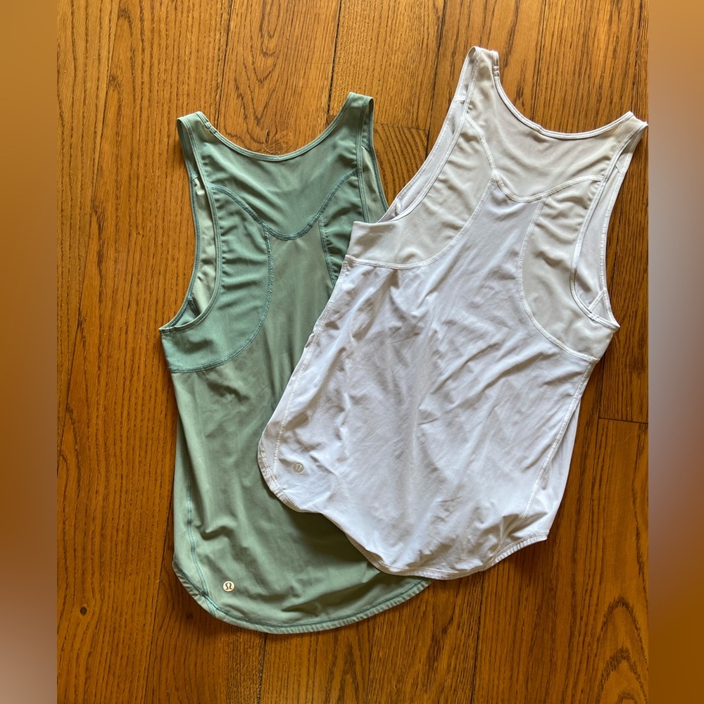 Set of 2 lululemon tanks measure 15 1/2 pit to pit